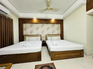Super Deluxe Four Bed with Balcony 2